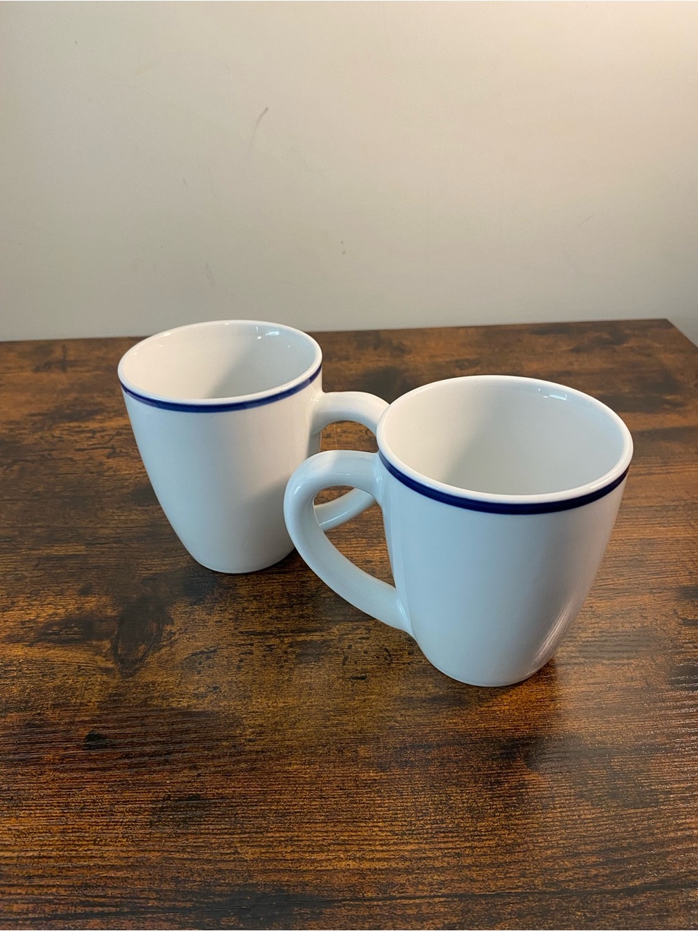 Maitre De Porcelain Oneida White Ceramic Mugs with Blue Rim - Pair